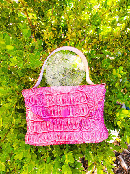 Pink faux crocodile purse